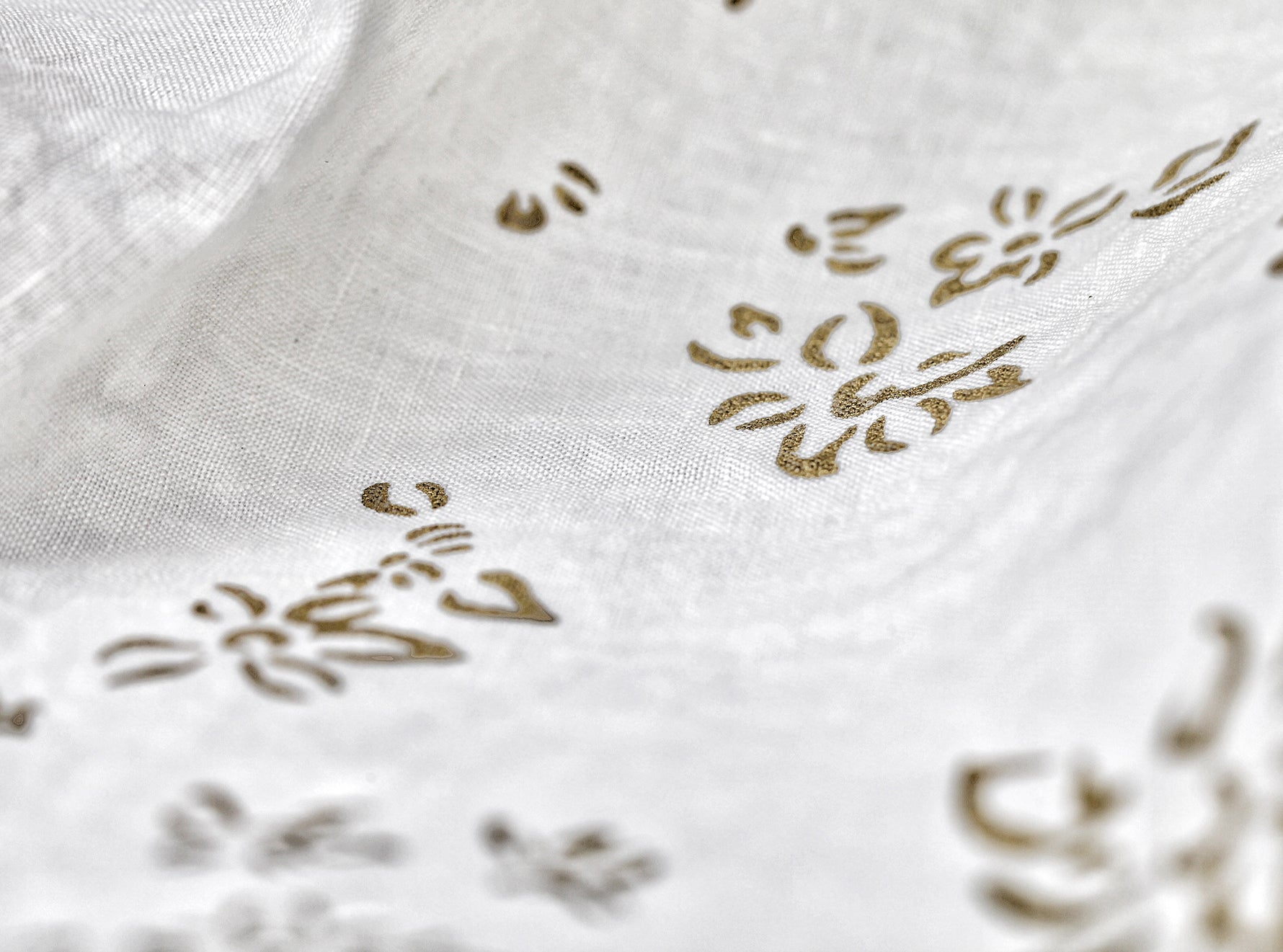 Bernadette's Hand Stamped Falling Flower Linen Napkin in Gold, 50x50cm